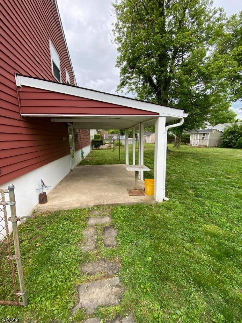 721 Lawrence Road Bound Brook, NJ 08805 - Photo 20 of 21 a front view of a house with garden