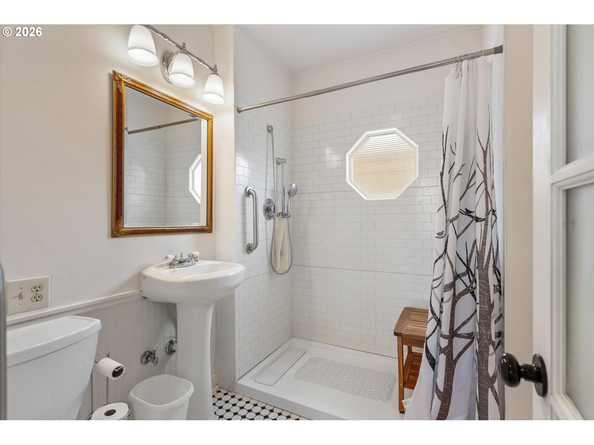 1439 3rd Street Baker City, OR 97814 - Photo 25 of 42 a bathroom with a sink mirror and vanity