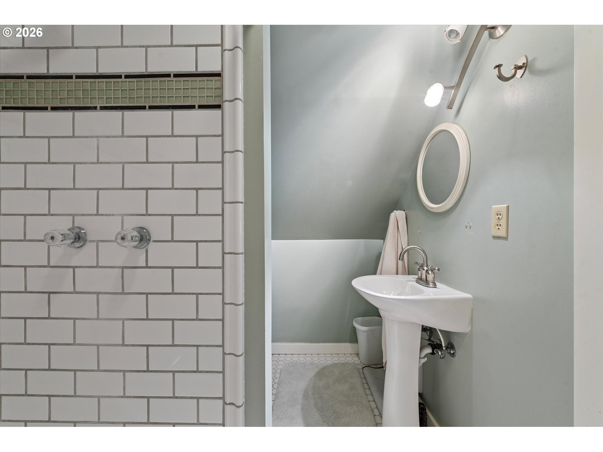 1439 3rd Street Baker City, OR 97814 - Photo 30 of 42 a bathroom with a sink a toilet and a mirror