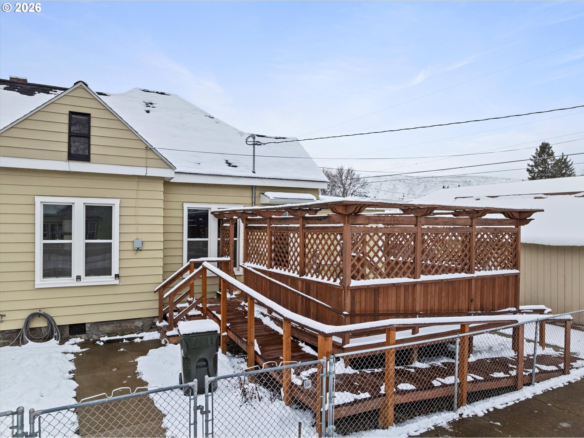 1439 3rd Street Baker City, OR 97814 - Photo 6 of 42 a front view of a house with windows