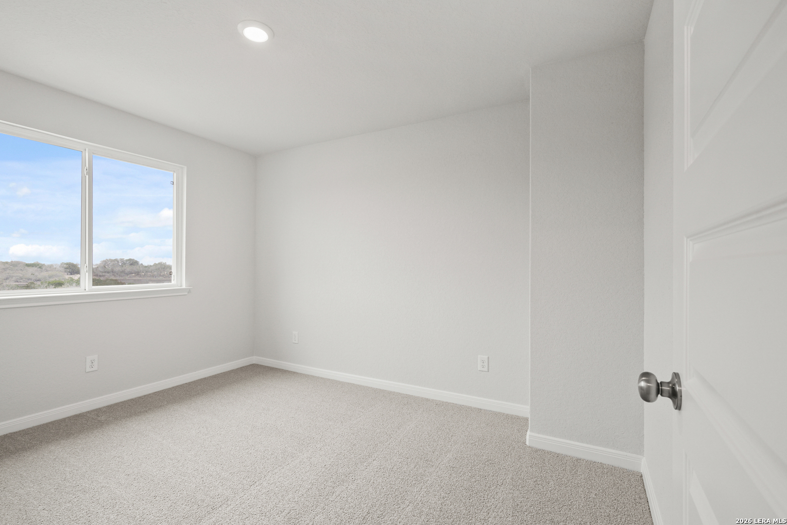 13627 Helton Pass St. Hedwig, TX 78152 - Photo 19 of 33 a view of an empty room with a window