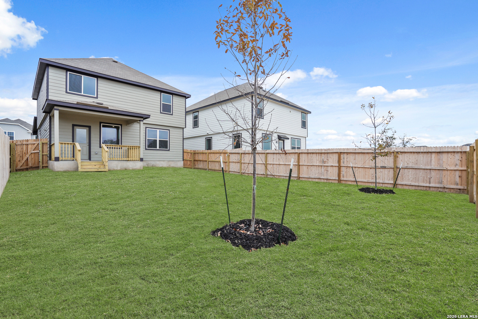 13627 Helton Pass St. Hedwig, TX 78152 - Photo 25 of 33 a view of a house with a backyard