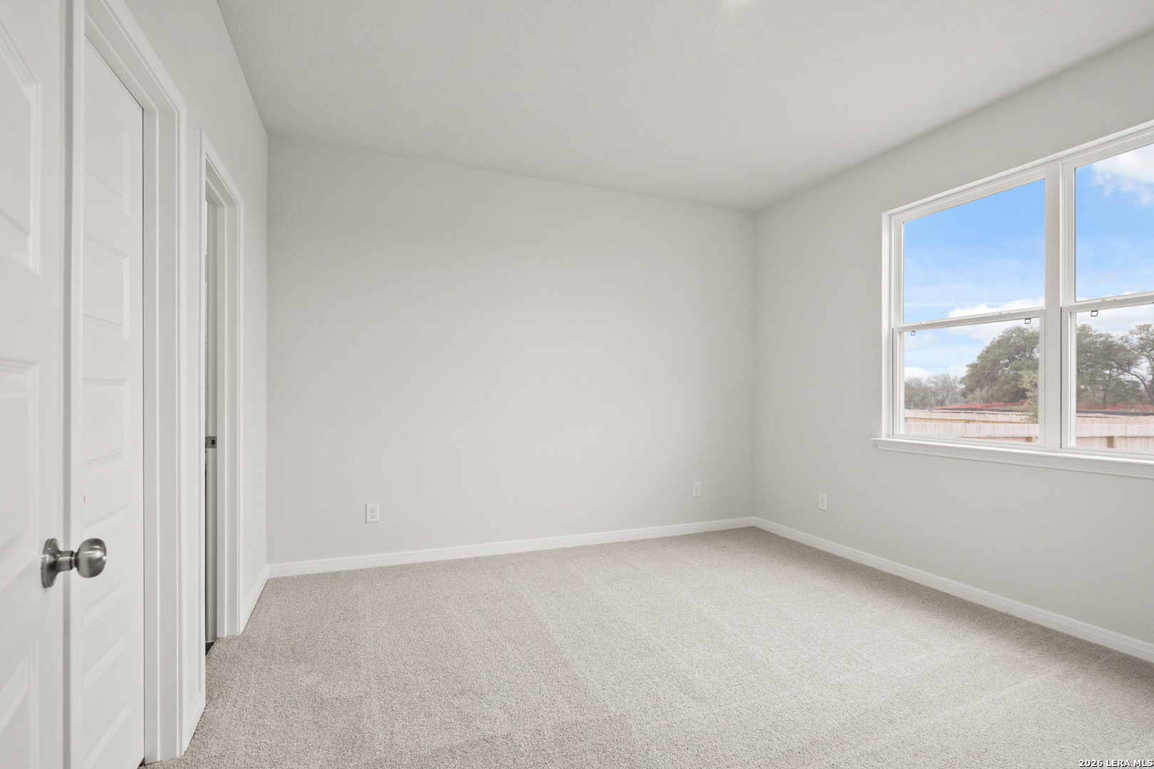 13627 Helton Pass St. Hedwig, TX 78152 - Photo 9 of 33 a view of an empty room with a window