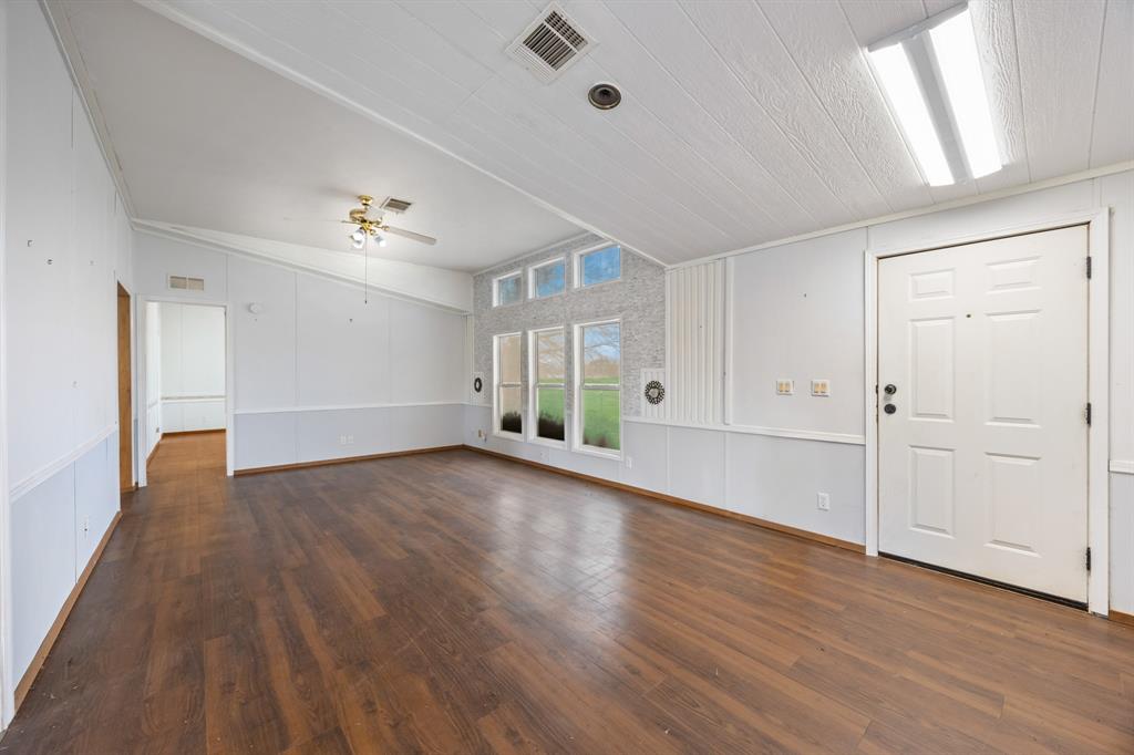 364 Rs County Road 4530 Point, TX 75472 - Photo 12 of 31 a view of empty room with wooden floor and fan