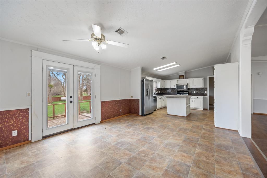 364 Rs County Road 4530 Point, TX 75472 - Photo 16 of 31 a living room with furniture and kitchen view