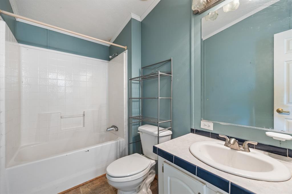 364 Rs County Road 4530 Point, TX 75472 - Photo 23 of 31 a bathroom with a sink toilet and shower