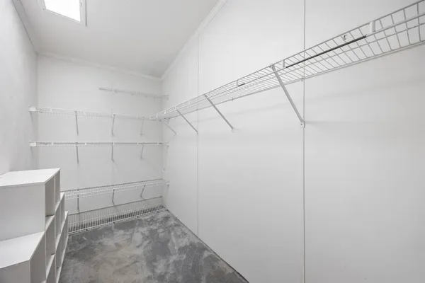 a view of a room with racks on the wall