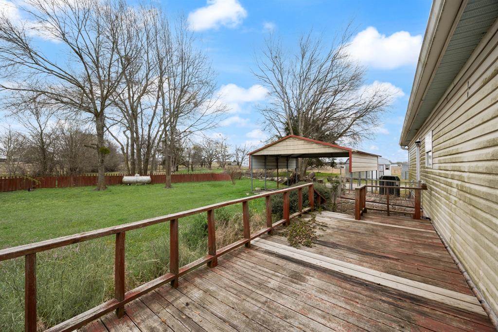 364 Rs County Road 4530 Point, TX 75472 - Photo 30 of 31 a view of a house with backyard and sitting area