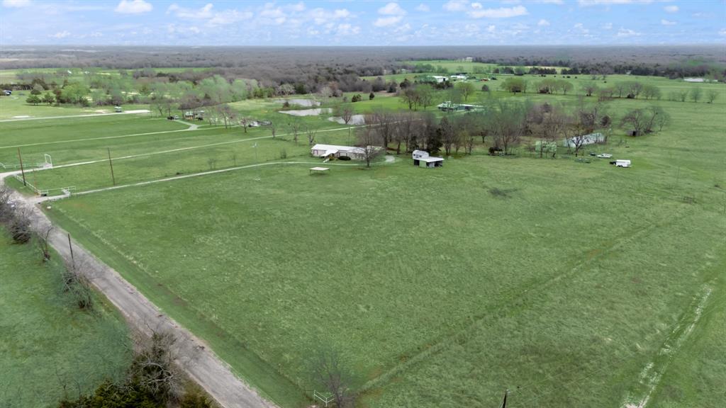 364 Rs County Road 4530 Point, TX 75472 - Photo 3 of 31 a view of a green field with clear sky