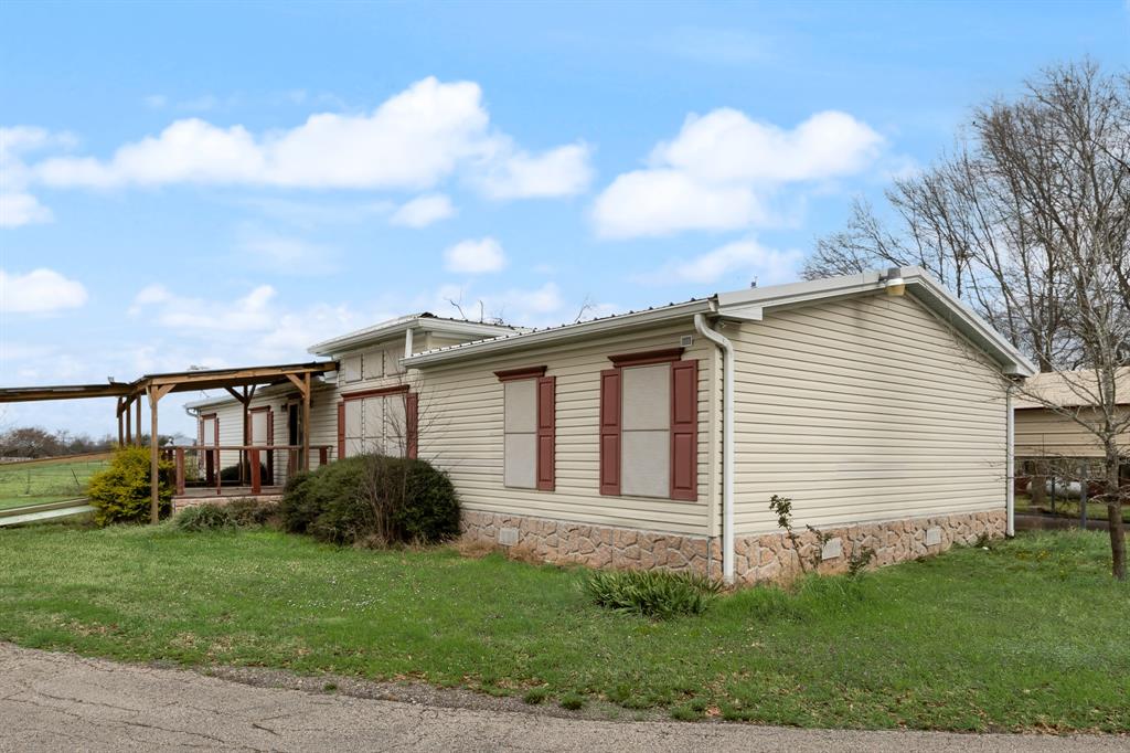 364 Rs County Road 4530 Point, TX 75472 - Photo 10 of 31 a view of a house with a backyard
