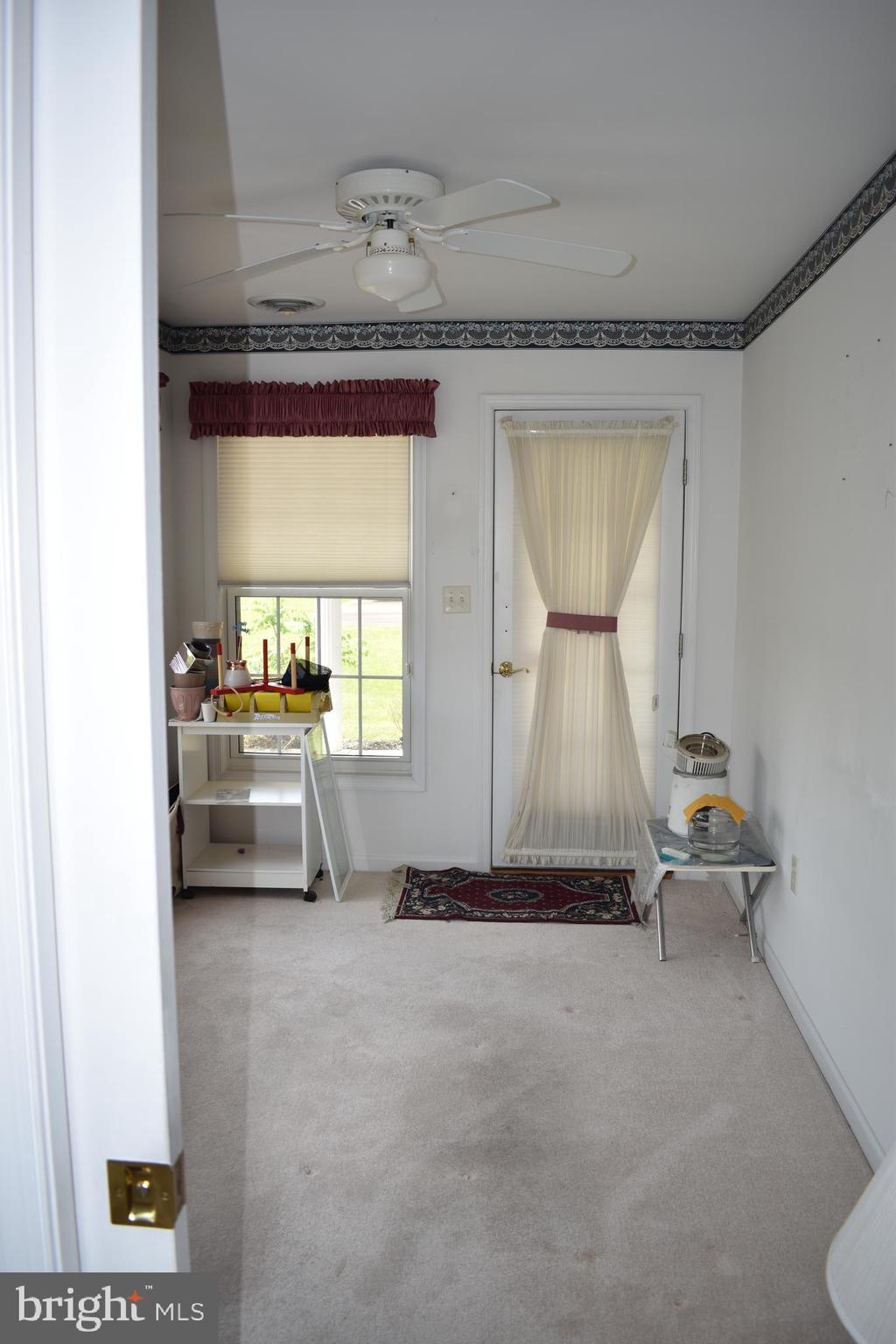 1206 Rabbit Court Hagerstown, MD 21740 - Photo 16 of 35 Sunroom is bright and cheerful-patio access