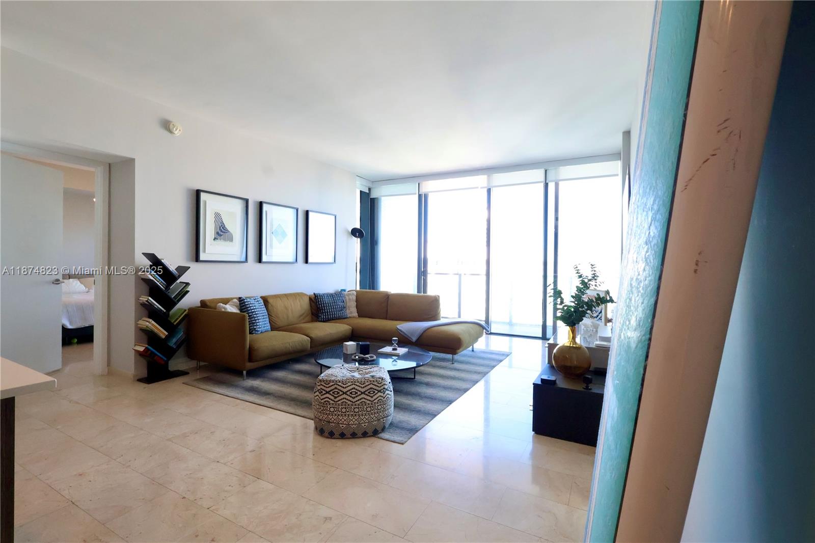 68 Southeast 6th Street, Unit 3607 Miami, FL 33131 - Photo 6 of 29 a living room with furniture and a large window