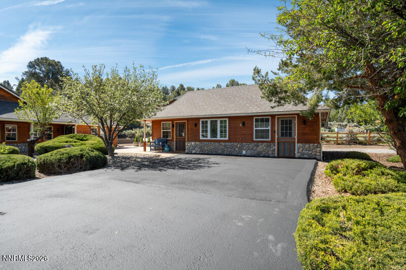 1931 Lousetown Road Reno, NV 89521 - Photo 26 of 51 front view of a house with a garden