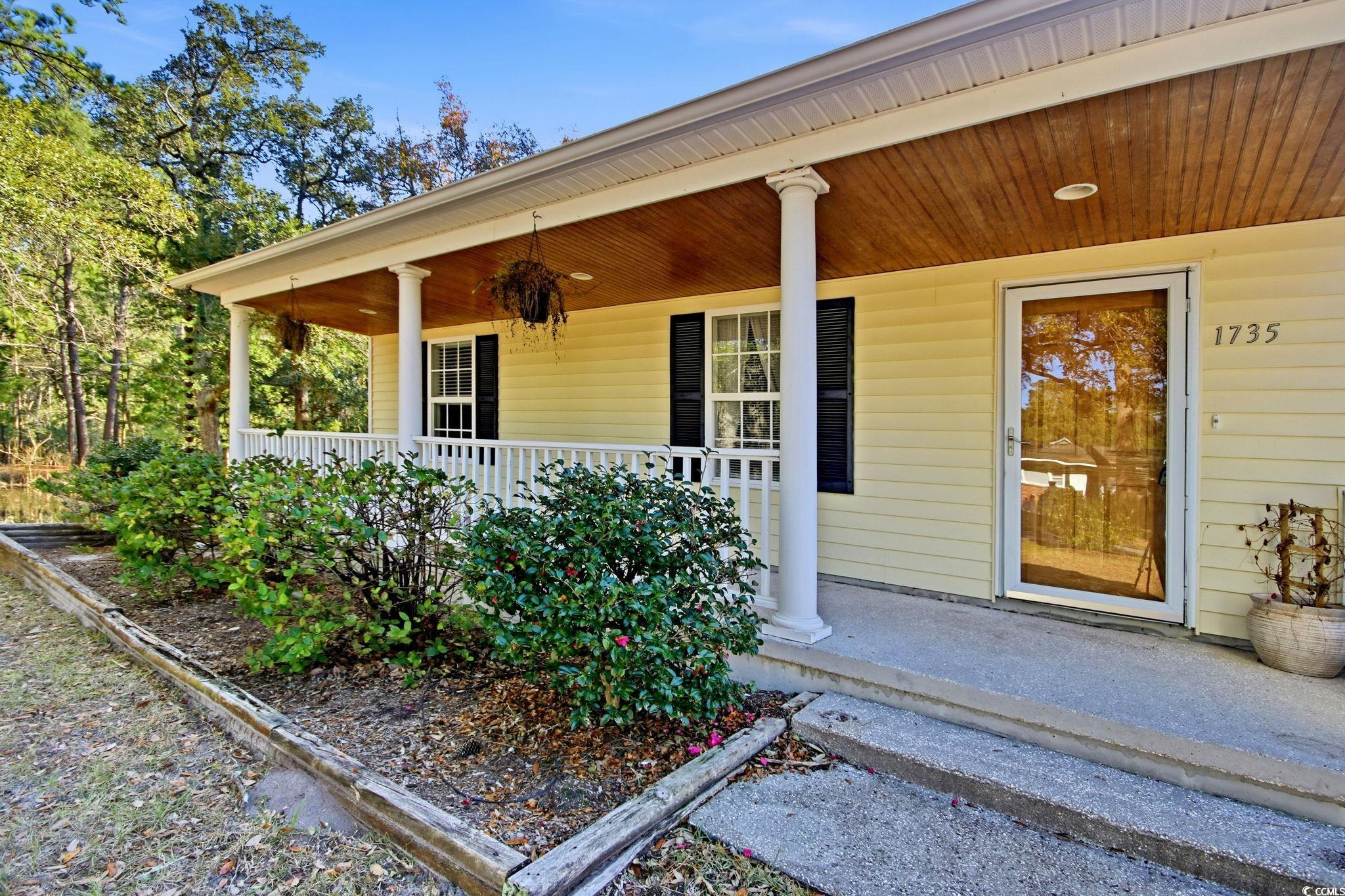1735 Rice Street Georgetown, SC 29440 - Photo 2 of 34 Doorway to property with a porch