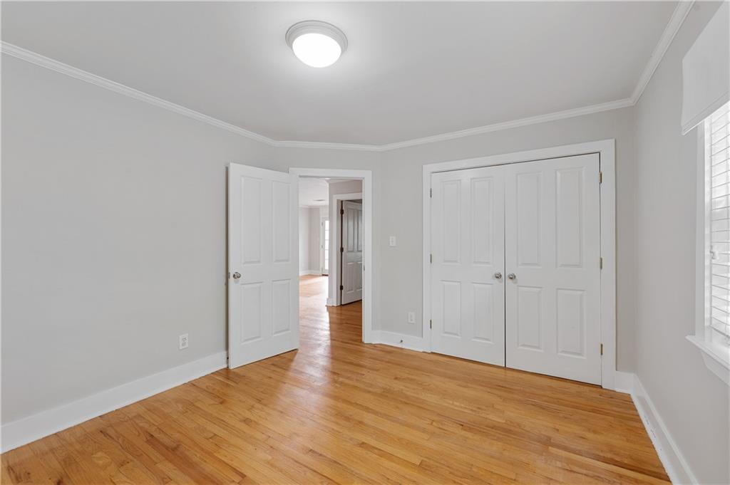 866 Briarcliff Road Northeast, Unit B3 Atlanta, GA 30306 - Photo 10 of 17 a view of an empty room and wooden floor
