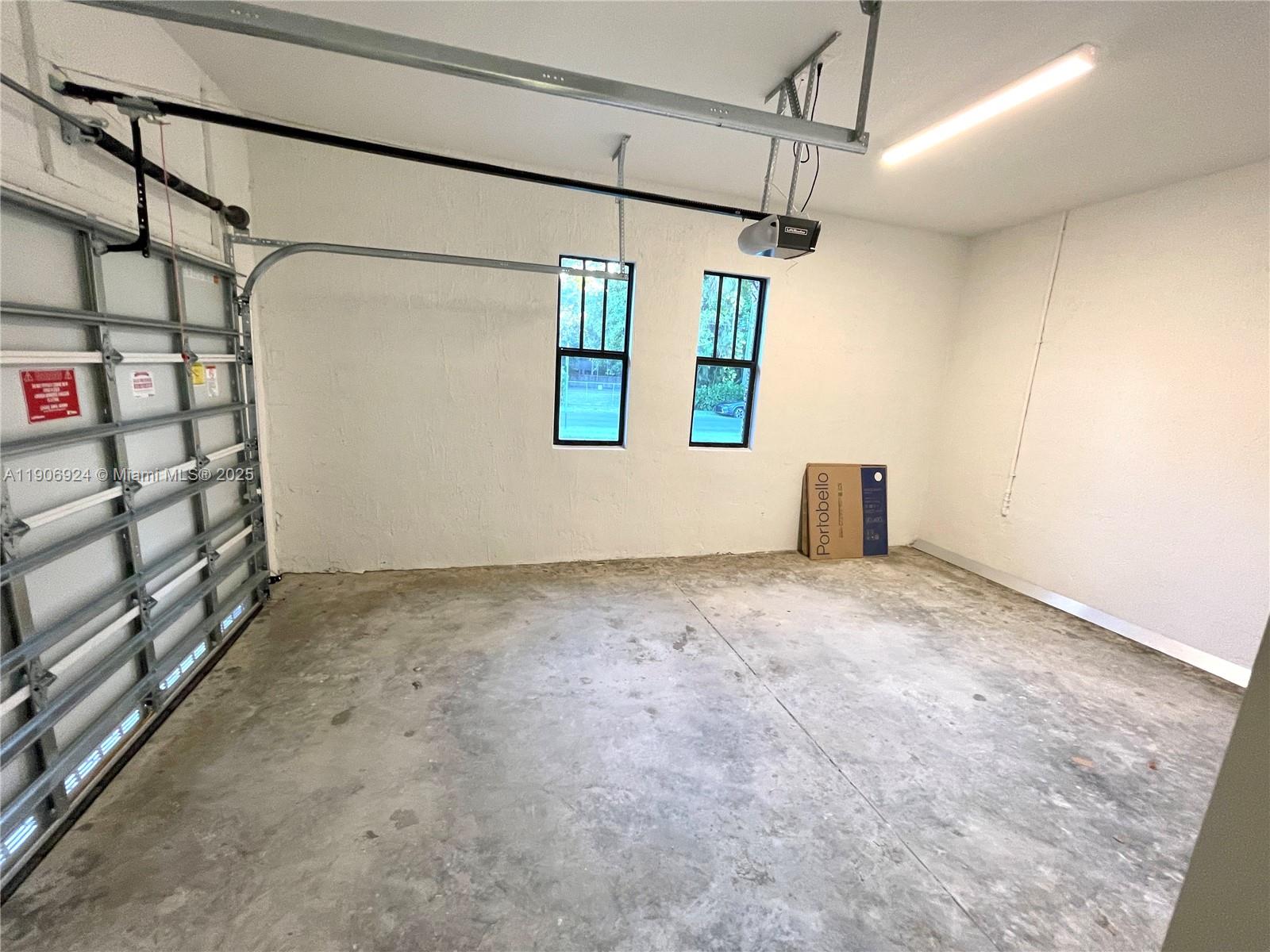 11181 Southwest 92nd Avenue, Unit 11181 Miami, FL 33176 - Photo 32 of 47 a view of a garage