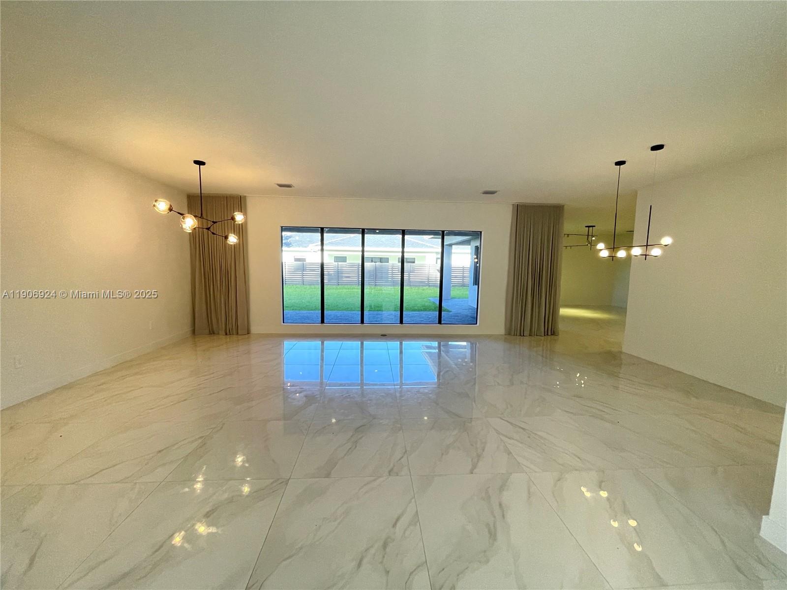 11181 Southwest 92nd Avenue, Unit 11181 Miami, FL 33176 - Photo 7 of 47 a bathroom with a large tub and shower