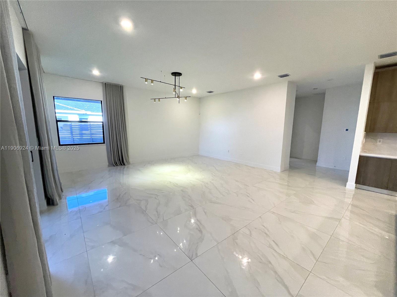 11181 Southwest 92nd Avenue, Unit 11181 Miami, FL 33176 - Photo 10 of 47 a view of a hallway with a bathroom