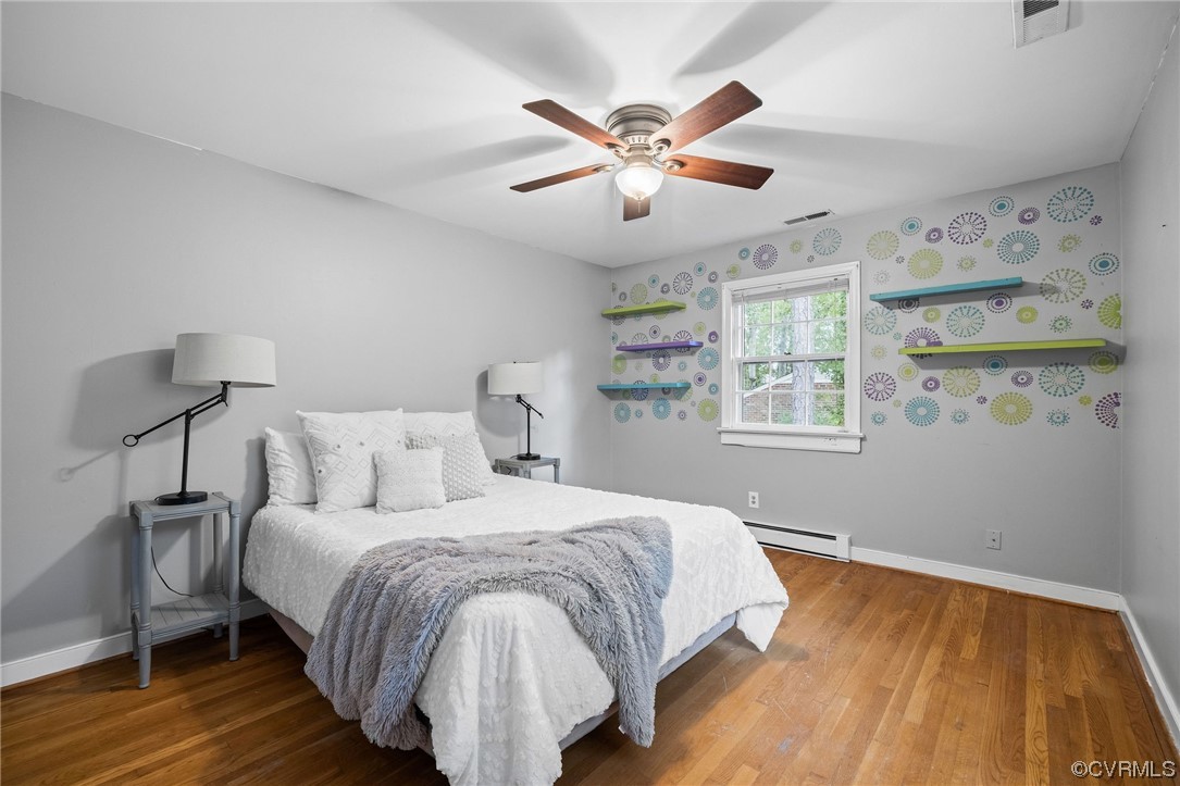 274 Philray Road North Chesterfield, VA 23236 - Photo 28 of 34 a bedroom with a large bed and a window