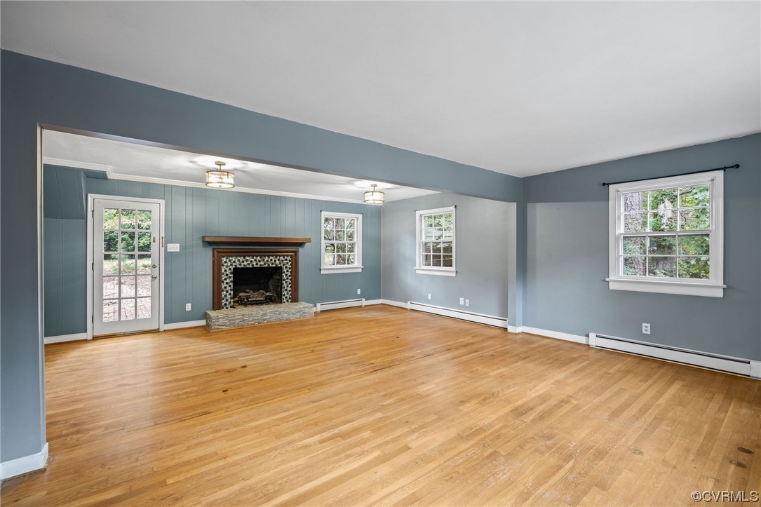 274 Philray Road North Chesterfield, VA 23236 - Photo 4 of 34 a view of empty room with wooden floor and fireplace