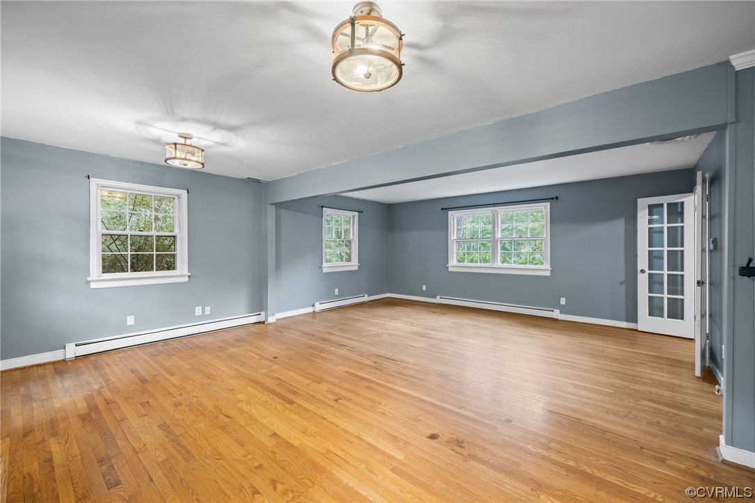 274 Philray Road North Chesterfield, VA 23236 - Photo 8 of 34 a view of an empty room with a window and wooden floor