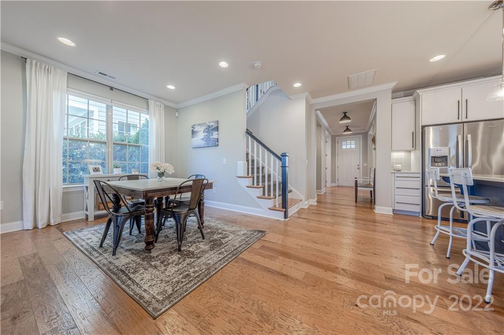 958 Emory Lane Fort Mill, SC 29708 - Photo 22 of 45 a view of a a dining room with furniture window and wooden floor