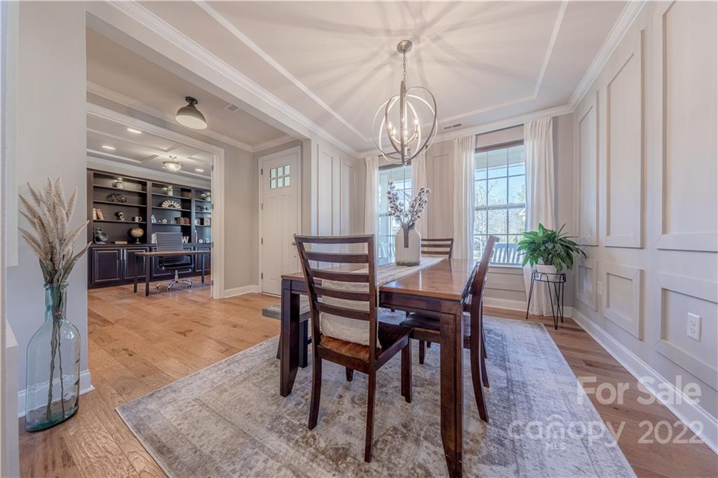 958 Emory Lane Fort Mill, SC 29708 - Photo 8 of 45 a view of a dining room with furniture window and wooden floor