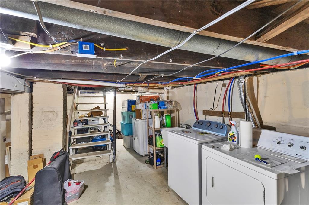 1747 Galilee Road Wampum, PA 16157 - Photo 15 of 32 The laundry space offers a tidy, well-planned spot for managing household essentials.