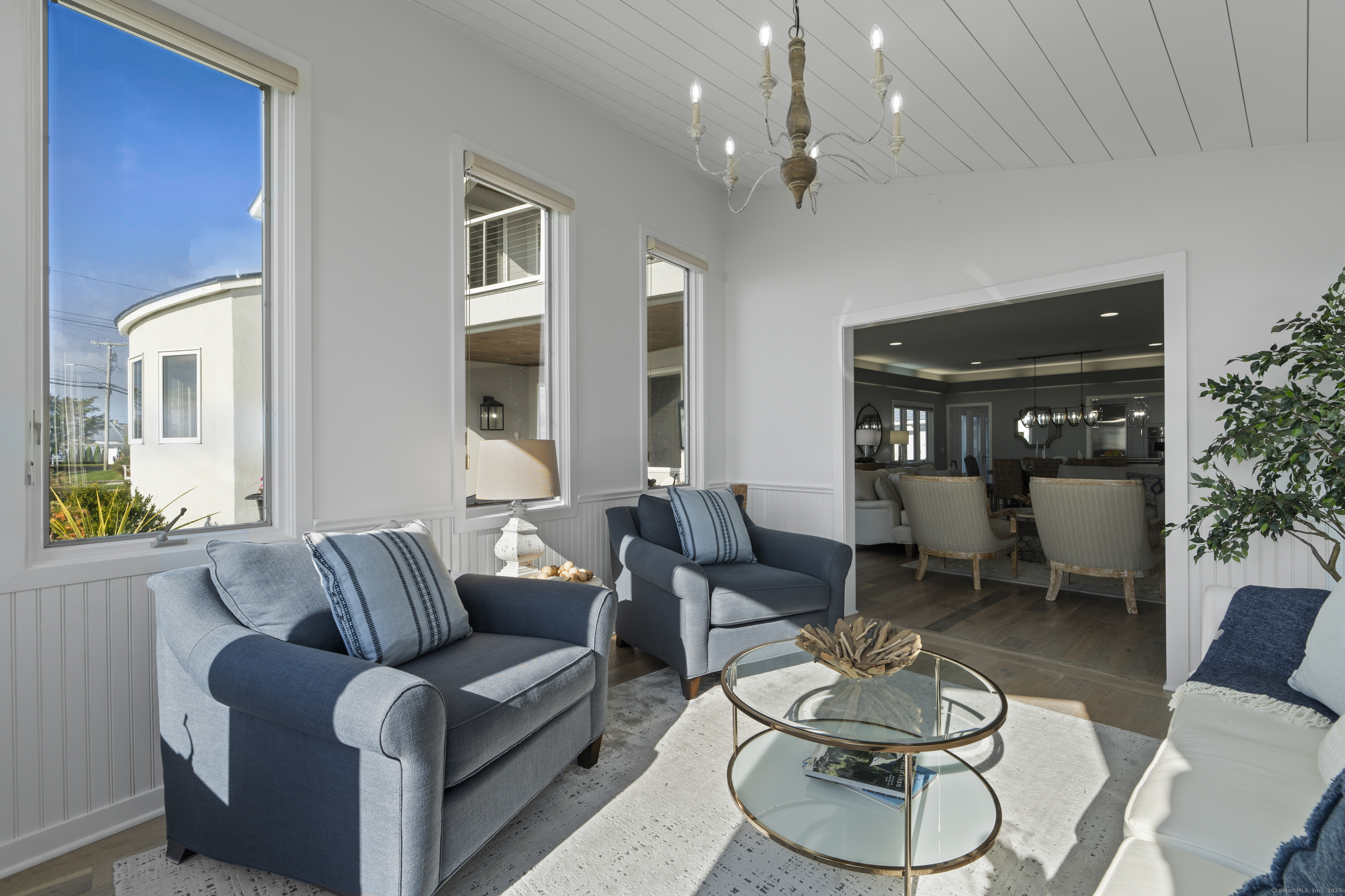 372 Maple Avenue Old Saybrook, CT 06475 - Photo 18 of 40 a living room with furniture and a large window