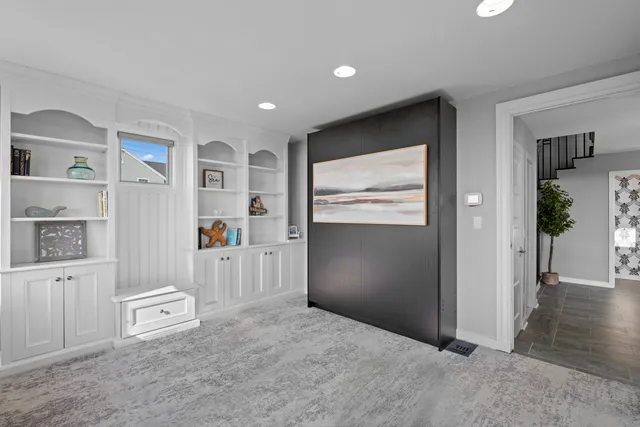 a view of livingroom with hardwood floor and cabinet