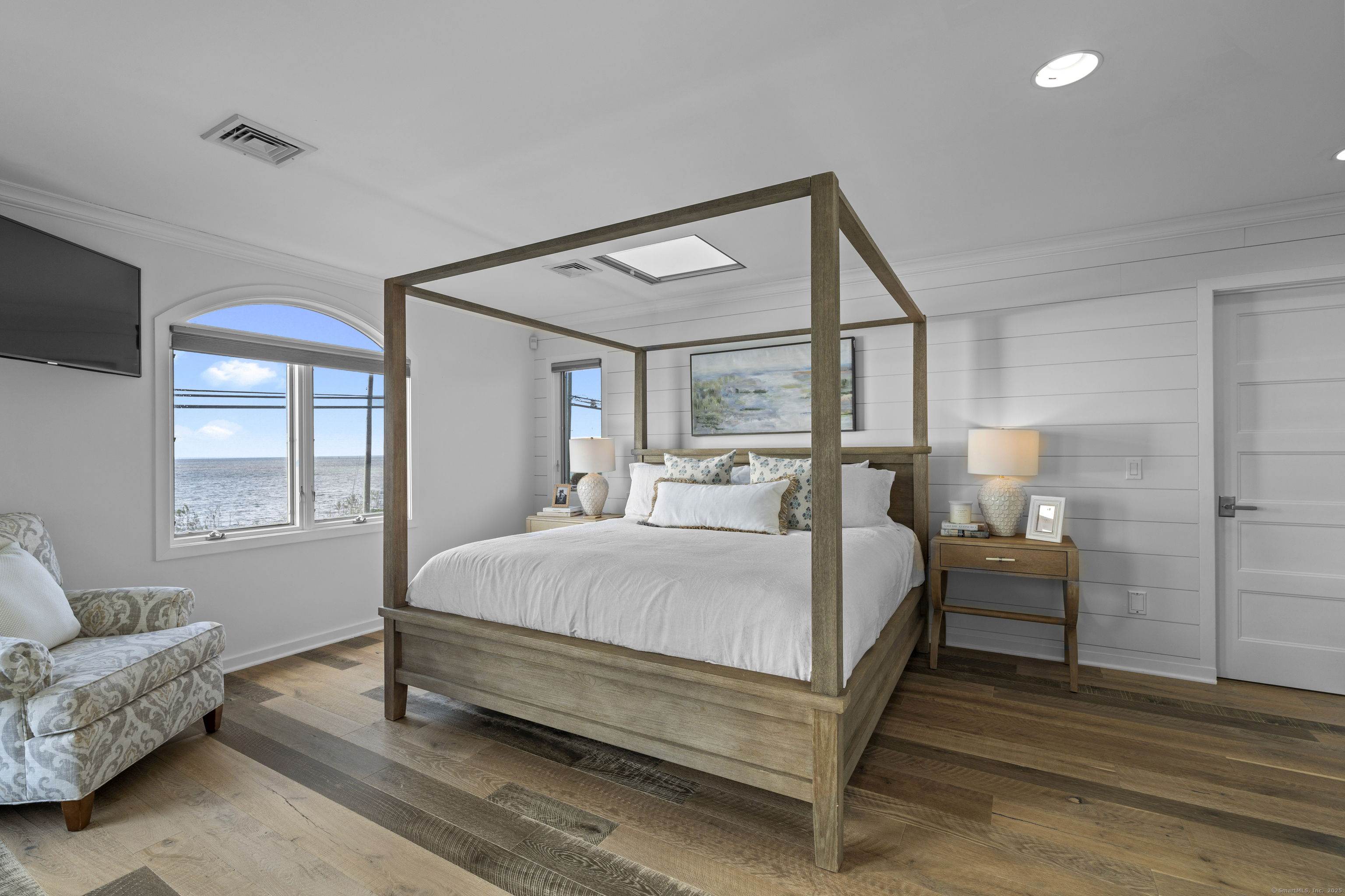 372 Maple Avenue Old Saybrook, CT 06475 - Photo 25 of 40 a bedroom with a bed couch and window