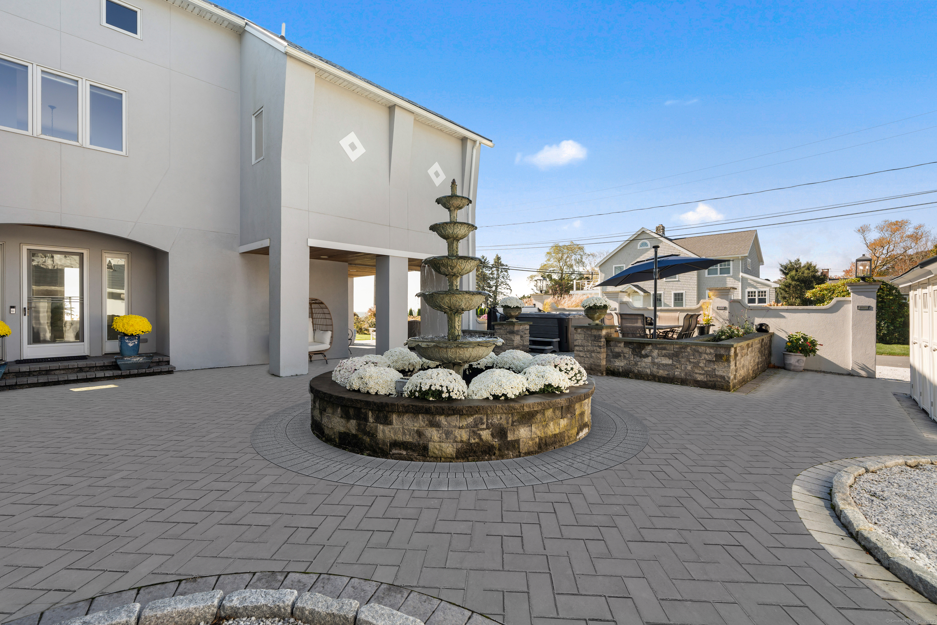 372 Maple Avenue Old Saybrook, CT 06475 - Photo 37 of 40 a living room with hard wood flooring and a fireplace