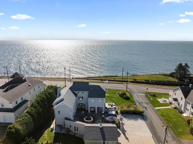 a view of a balcony with chairs