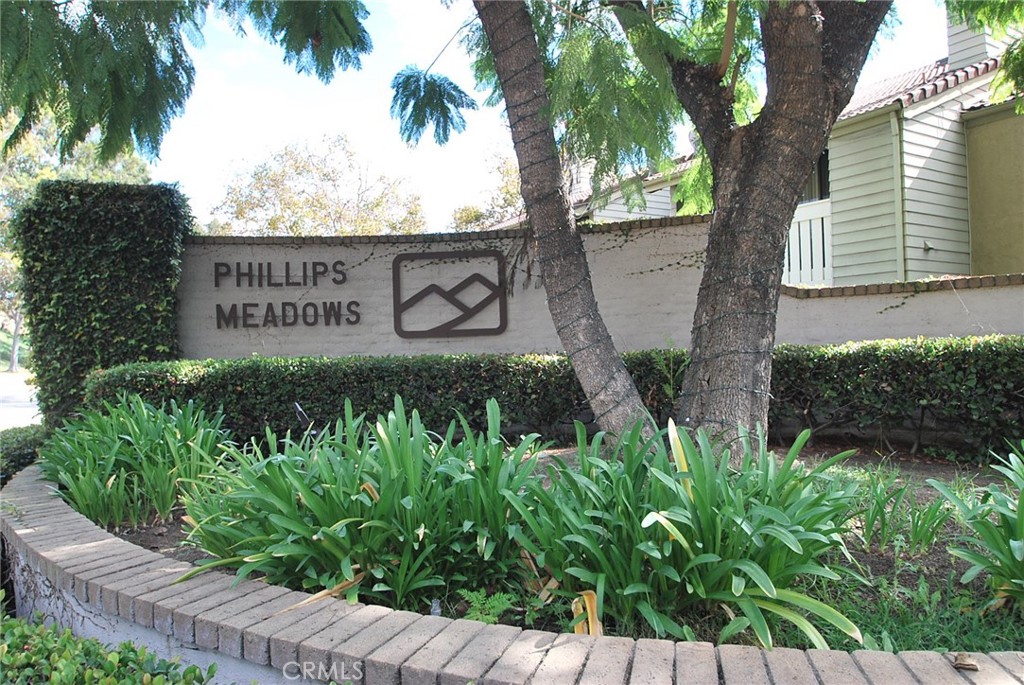 46 Town And Country Road Phillips Ranch, CA 91766 - Photo 27 of 37 a sign that is on a wooden wall