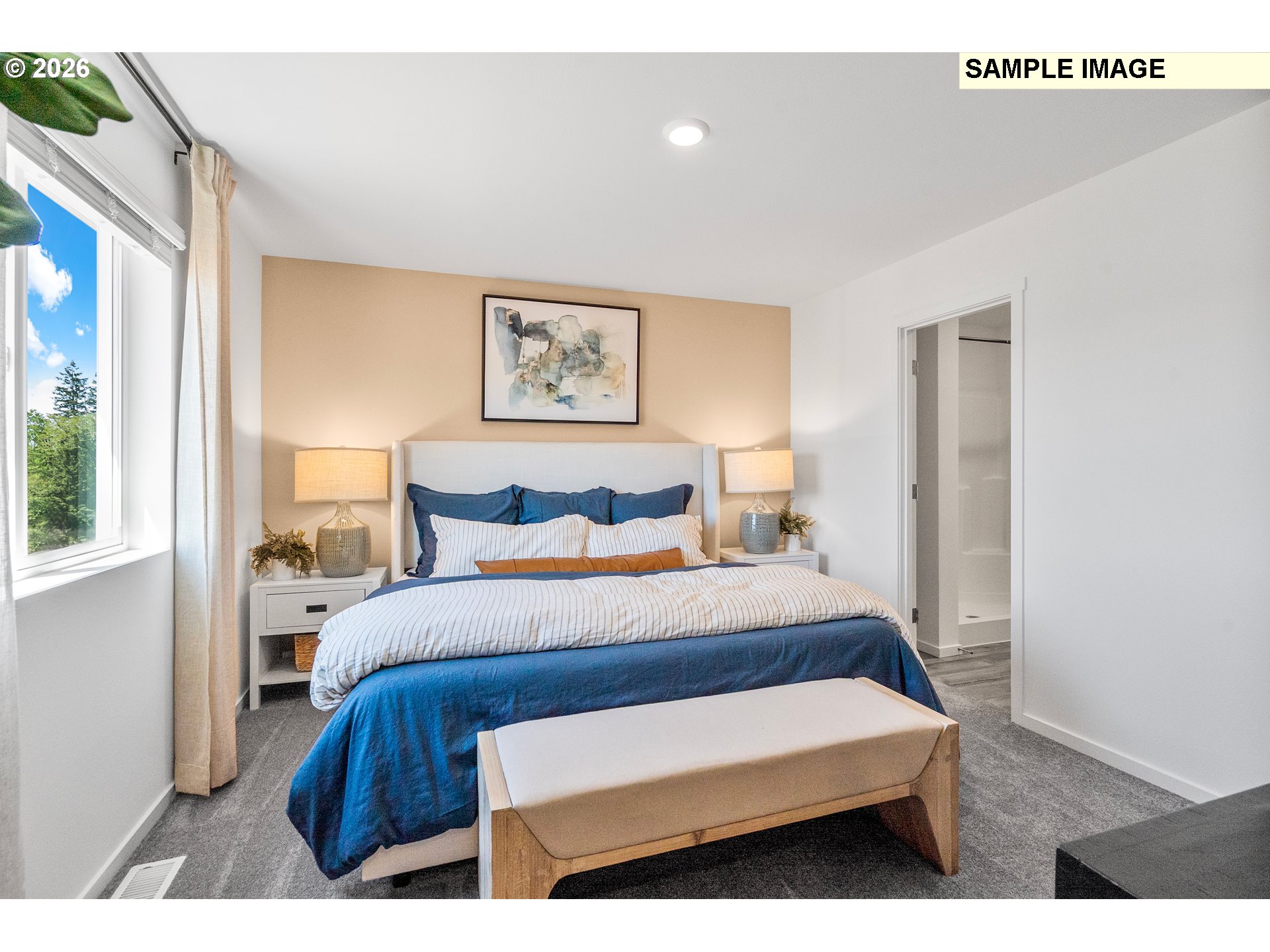 5754 Bainbridge Road Eugene, OR 97402 - Photo 21 of 29 a bedroom with a bed and a painting on the wall