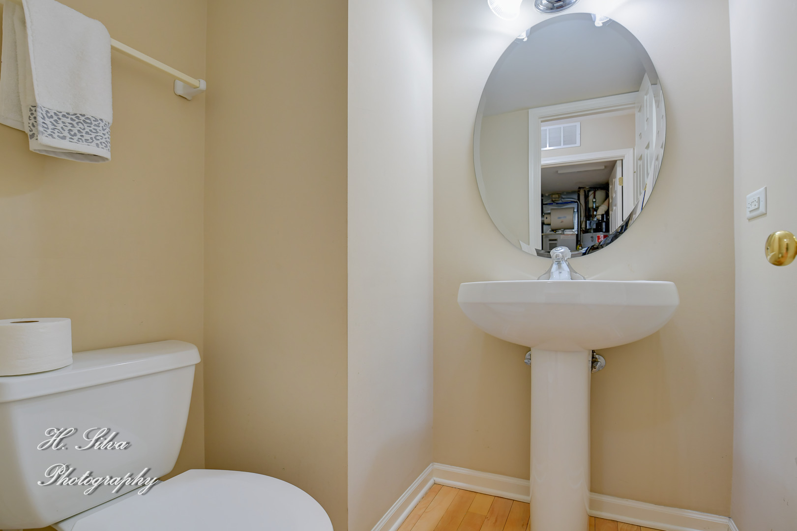 9425 Rainsford Drive Huntley, IL 60142 - Photo 15 of 15 a bathroom with a toilet sink and mirror