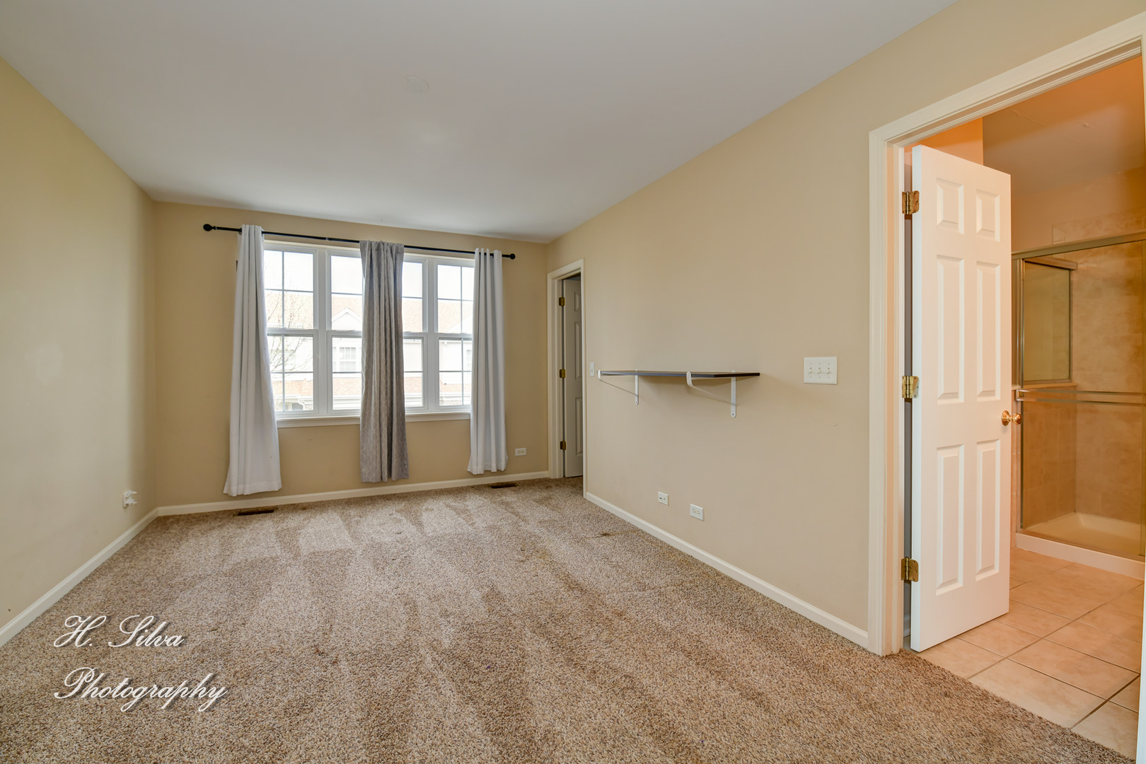 9425 Rainsford Drive Huntley, IL 60142 - Photo 9 of 15 a view of an empty room with a window