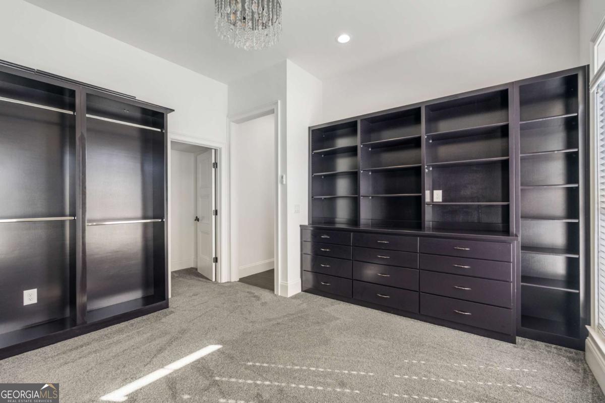 8904 Lilly Rock Way Midland, GA 31820 - Photo 28 of 49 a room with a furniture and wooden floor