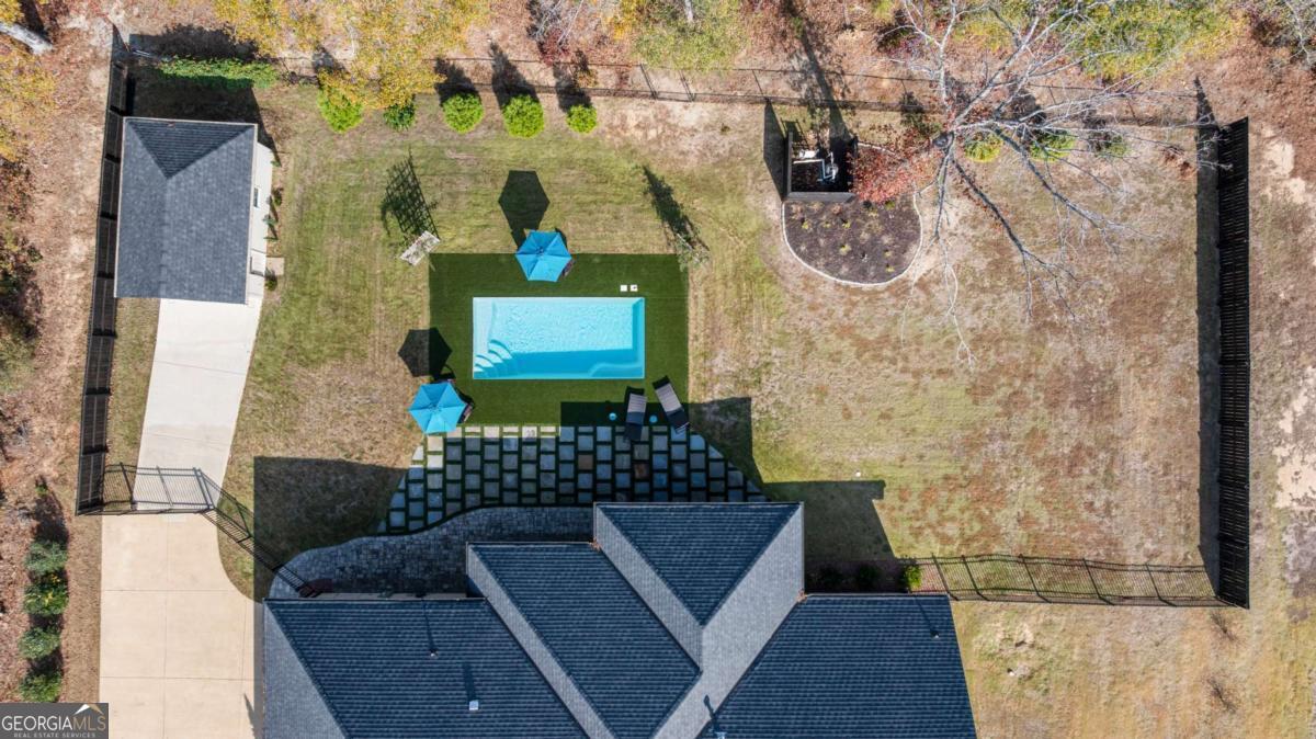 8904 Lilly Rock Way Midland, GA 31820 - Photo 46 of 49 a bathroom with a toilet and a shower