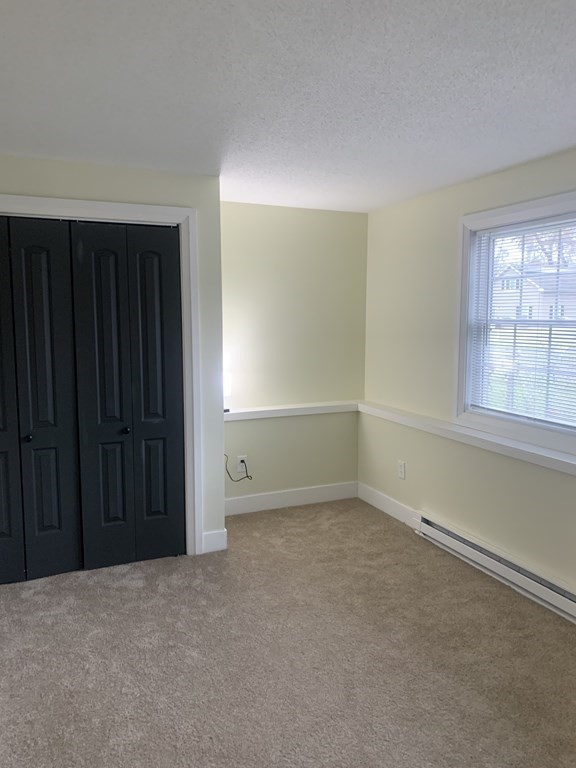 111 Warrenton Street Springfield, MA 01109 - Photo 14 of 18 an empty room with windows
