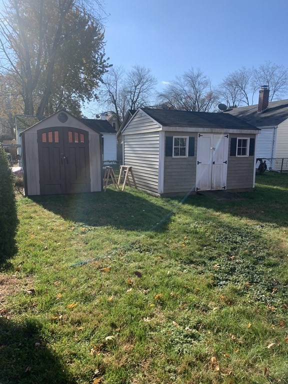 111 Warrenton Street Springfield, MA 01109 - Photo 18 of 18 a view of a yard in front of a house with large tree