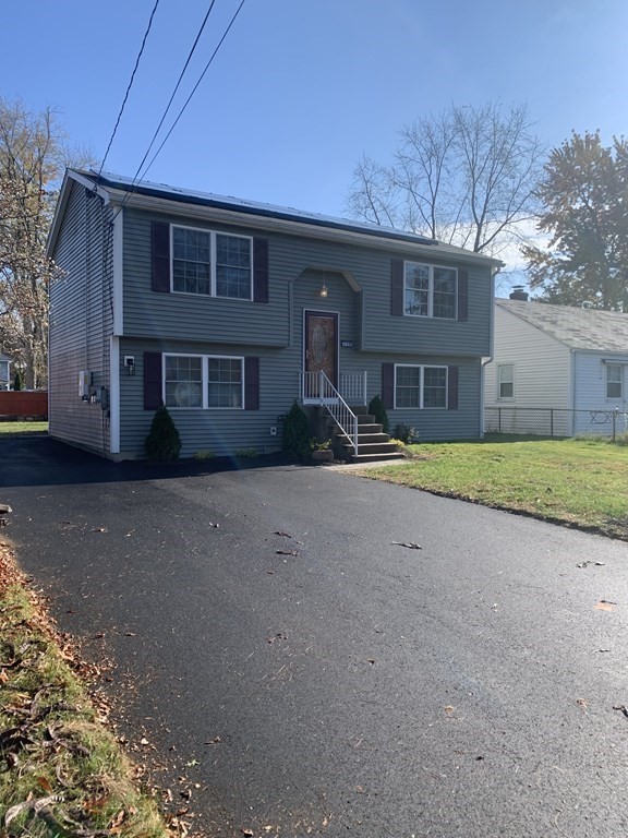 111 Warrenton Street Springfield, MA 01109 - Photo 3 of 18 a front view of house with yard and green space