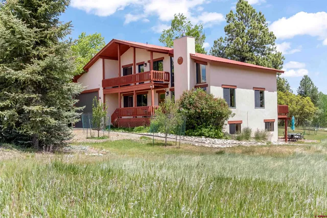 a view of a yard in front of house