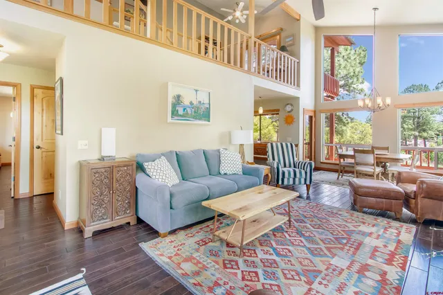 a living room with furniture and a table