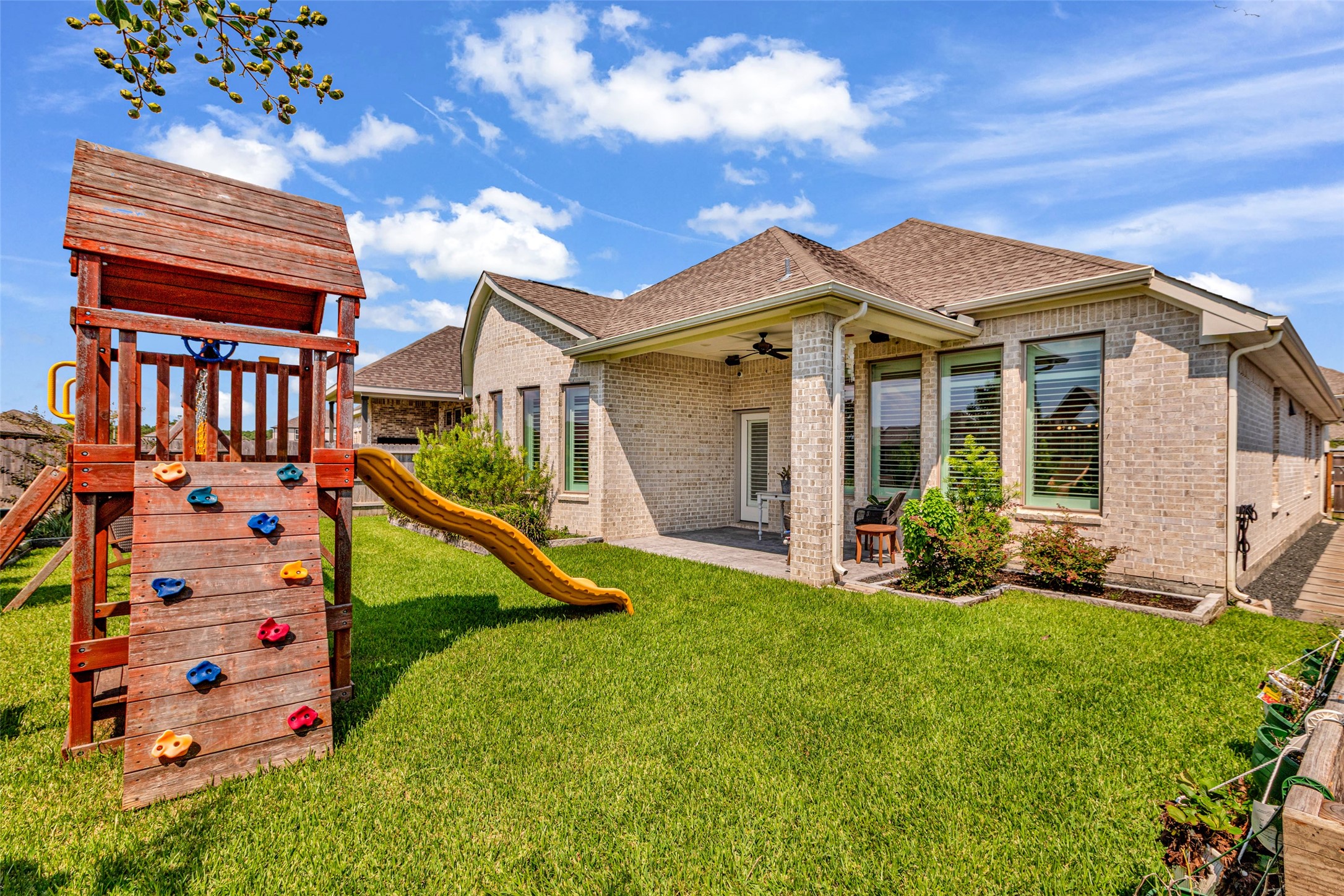 423 Bartlett Street Webster, TX 77598 - Photo 24 of 26 front view of a house with a yard