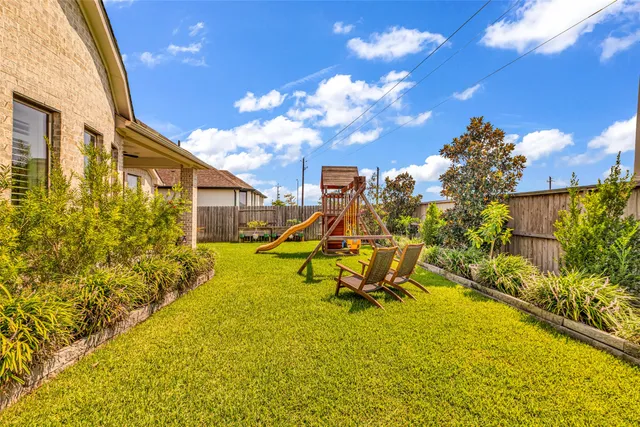 a view of an outdoor space pool patio and outdoor seating
