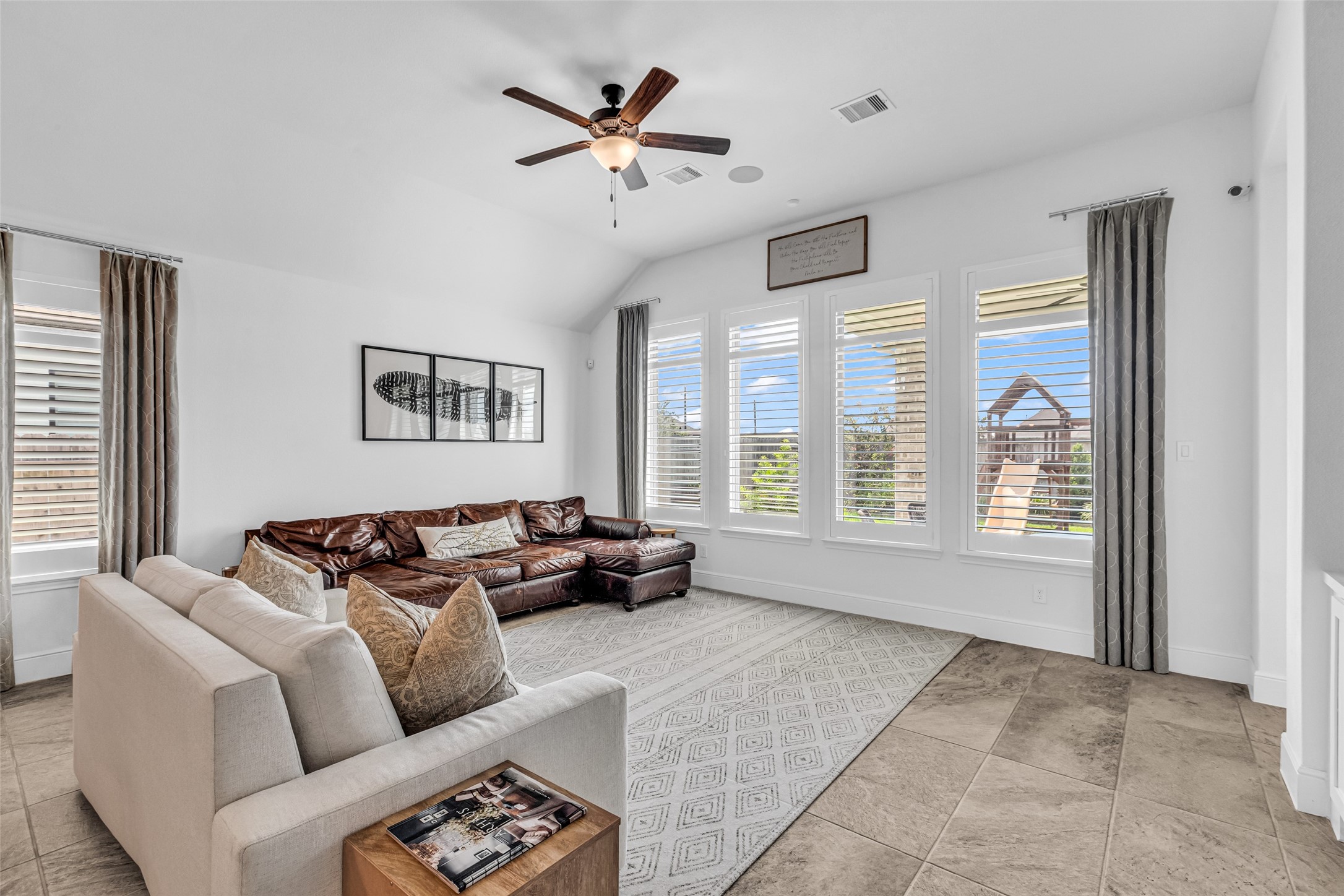 423 Bartlett Street Webster, TX 77598 - Photo 6 of 26 a living room with furniture and a large window