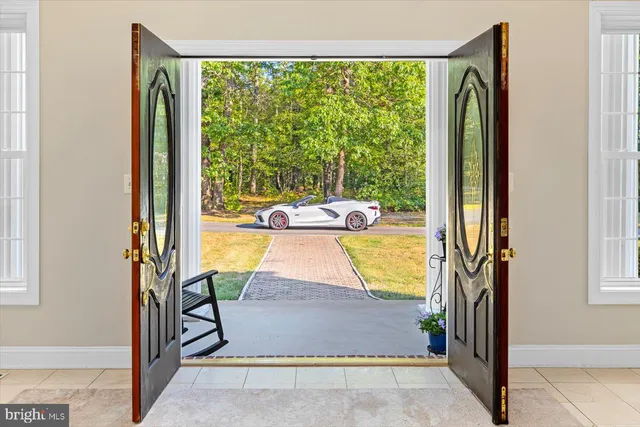 a bathroom with a sink toilet and mirror