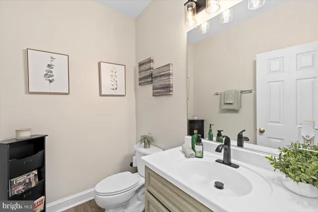 a view of a dinning table and chairs in back of the house