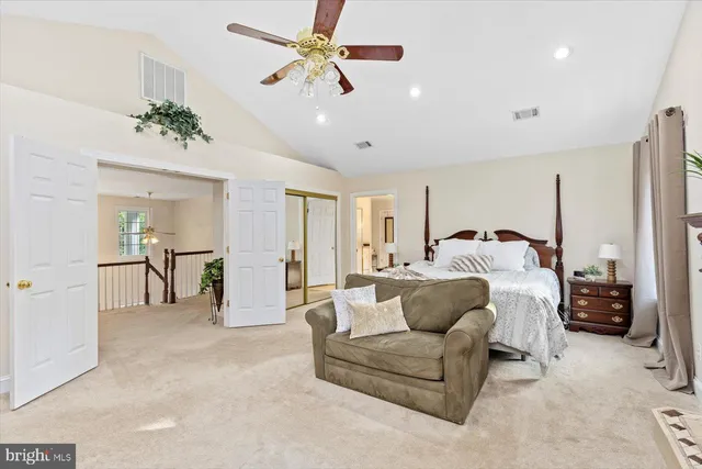 a kitchen with stainless steel appliances granite countertop a sink refrigerator and microwave